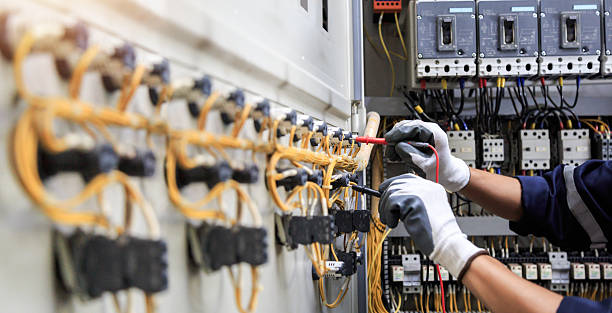 Professional Electrician technician working in University City, MO